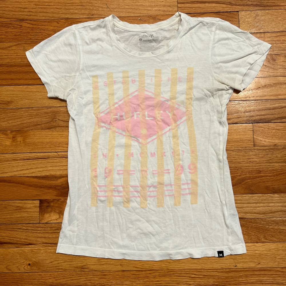 Super Soft, 100% Cotton Hurley White Graphic Tee with a Pink and Yellow Print